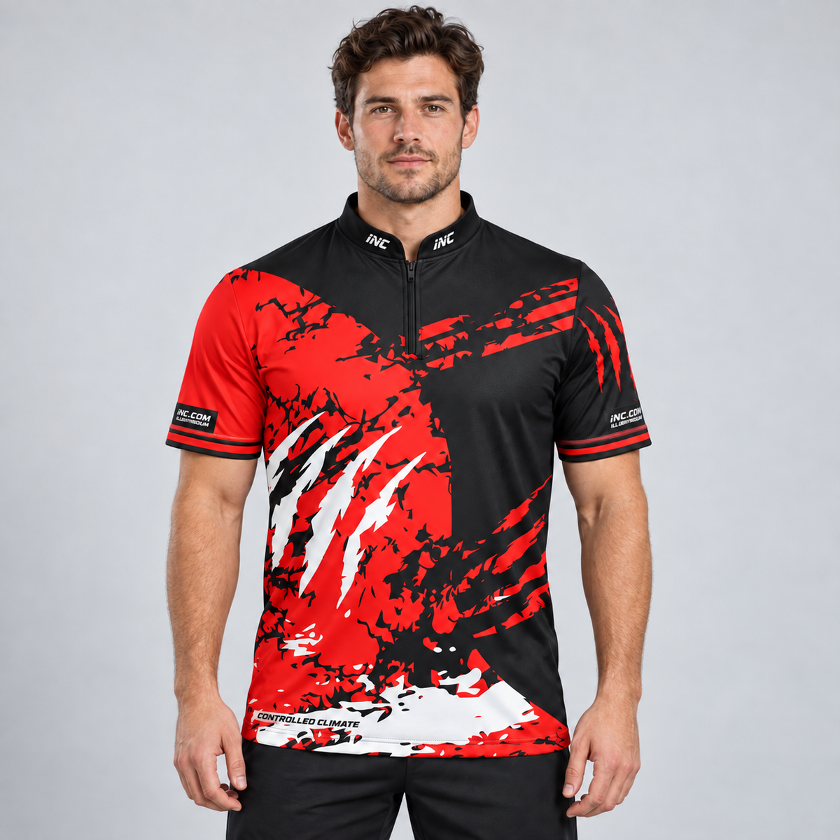 Front view of the Alpha Men and Youth Black White and Red Darts Shirt, showcasing the bold scratch panel design, modern cut, structured collar, and Controlled Climate hem logo.