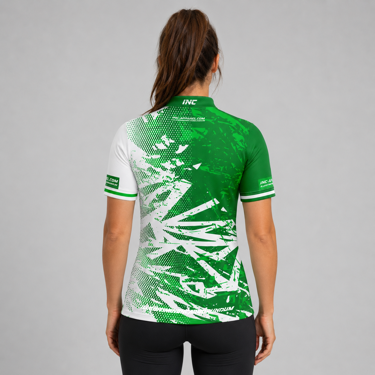 Back view of the Womens Bicolor pool shirt, showing the continuous green and white team contrast paneling.