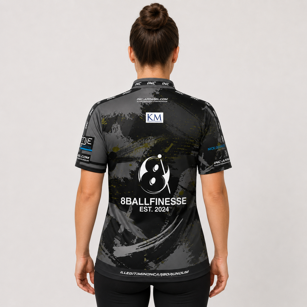 Back view of The Cue Club Women's 8 Ball Finesse Pool Shirt, showcasing the breathable contoured back paneling and streamlined shoulder cut.