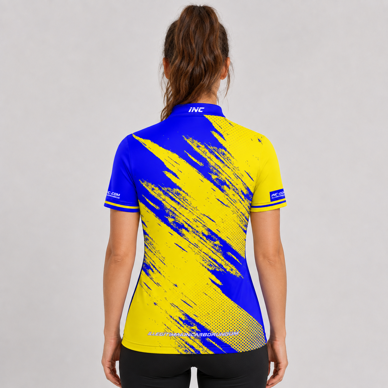 Back view of the Incursus Women's Blue and Yellow Darts and Pool Shirt, highlighting the breathable contoured back paneling and flexible shoulder cut.