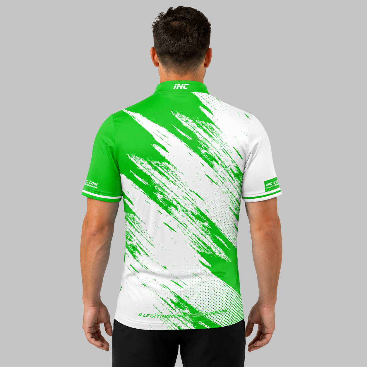 Back view of the Incursus Men and Youth Green and White Darts and Pool Shirt, highlighting the breathable rear paneling and flexible shoulder cut for unrestricted movement.