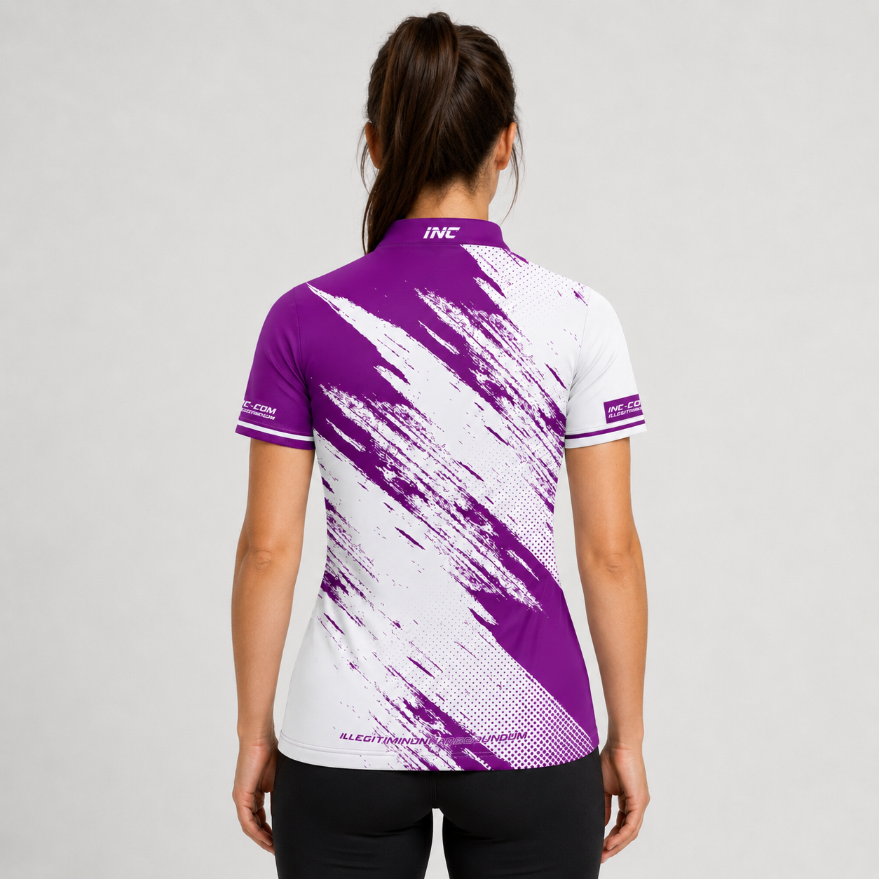 Back view of the Incursus Women's Purple and White Darts and Pool Shirt, highlighting the breathable contoured back paneling and flexible shoulder cut.