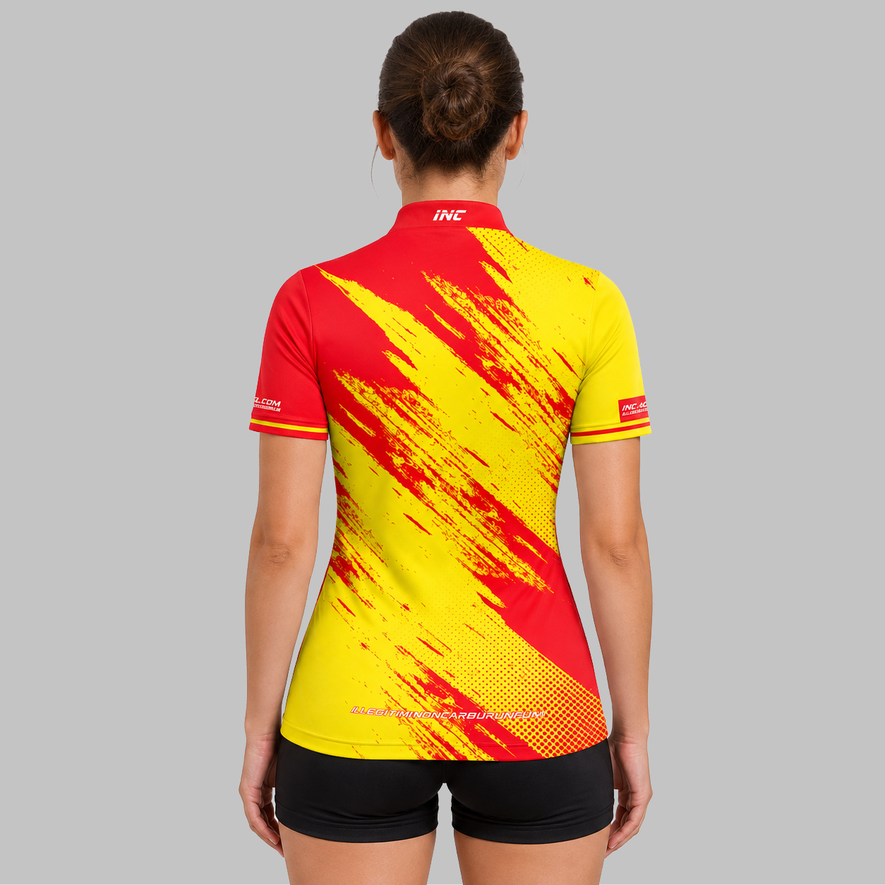 Back view of the Incursus Women's Red and Yellow Darts and Pool Shirt, highlighting the breathable contoured back paneling and flexible shoulder cut.