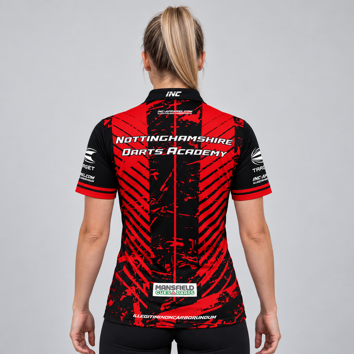 Back view of the Official Nottinghamshire Darts Academy Prodigy Elite Women's Shirt, showcasing breathable ventilation paneling and ergonomic sleeve construction for smooth throwing motion.