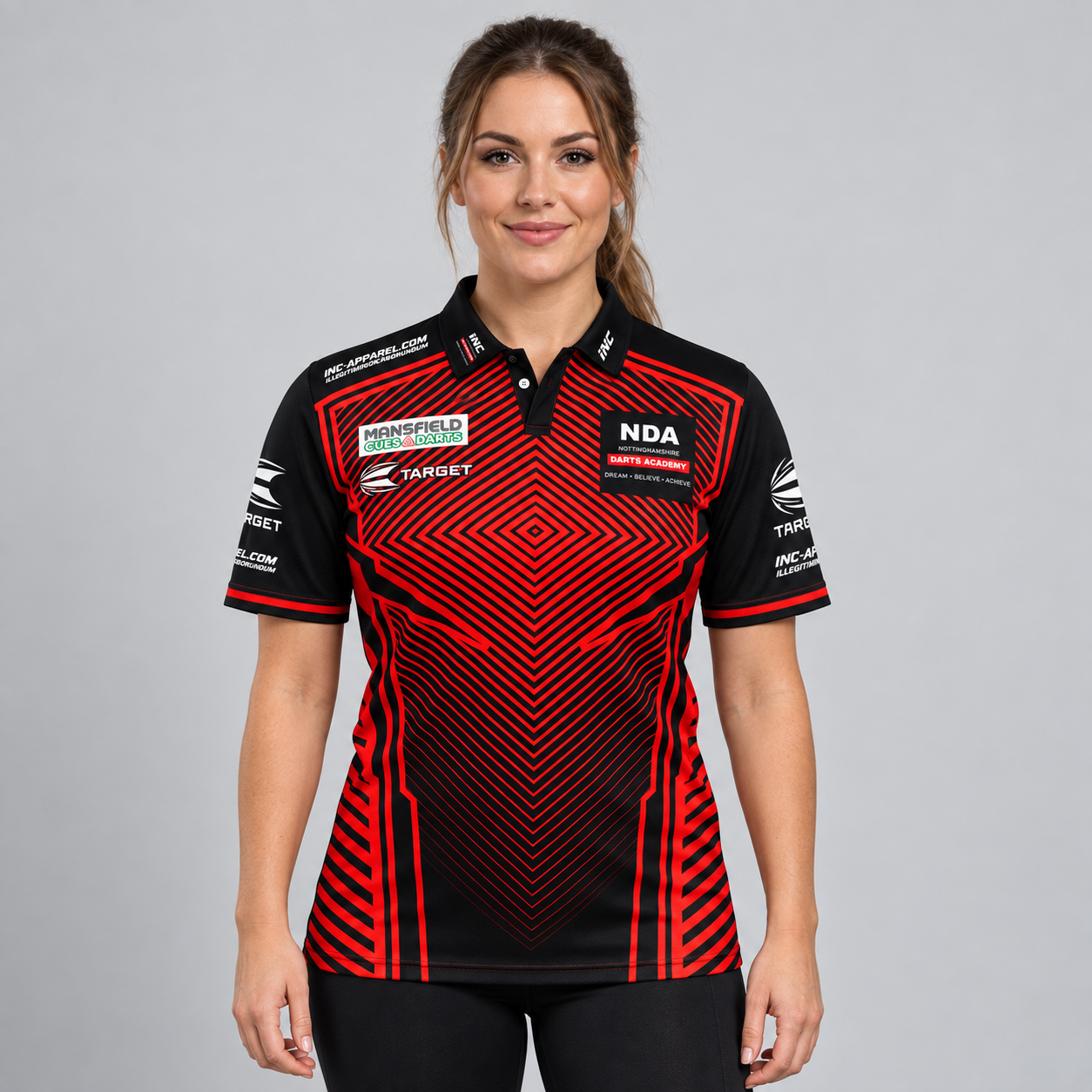 Front view of the Official Nottinghamshire Darts Academy Prodigy Women's Shirt, showcasing official academy branding, dynamic side paneling, and a tailored feminine silhouette.