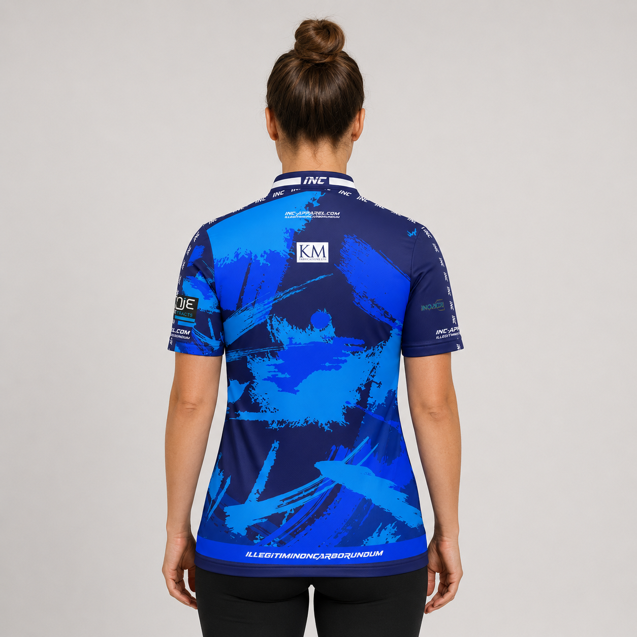 Back view of The Cue Club Women's The Railway Arms Pool Shirt, highlighting the breathable contoured back paneling and streamlined shoulder cut.