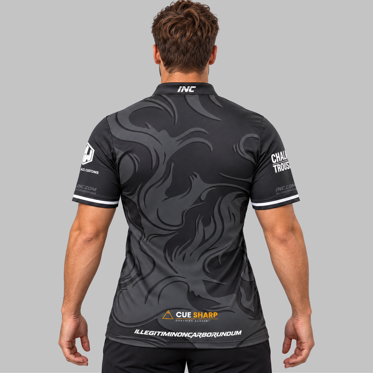 Back view of the Official Cue Sharp Coaching Men's and Youth Pool Shirt, highlighting the dark charcoal and gold paneling, upper collar branding, and athletic fit.