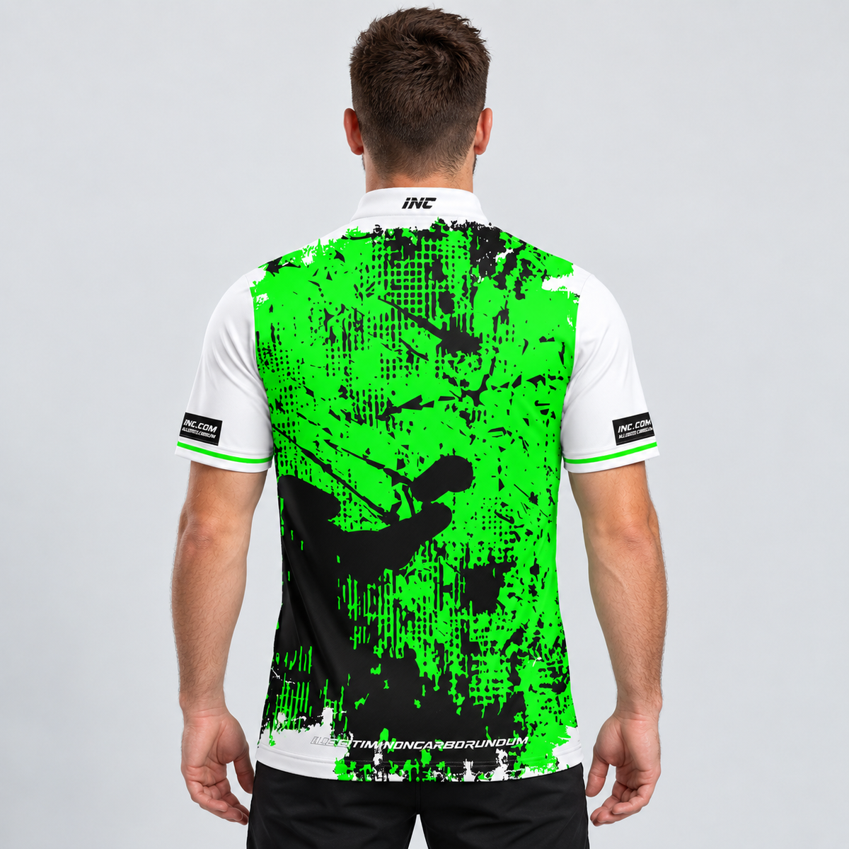 Back view of the Daemon Men and Youth White and Black Darts Shirt, highlighting the breathable rear paneling and flexible shoulder construction for unrestricted movement.