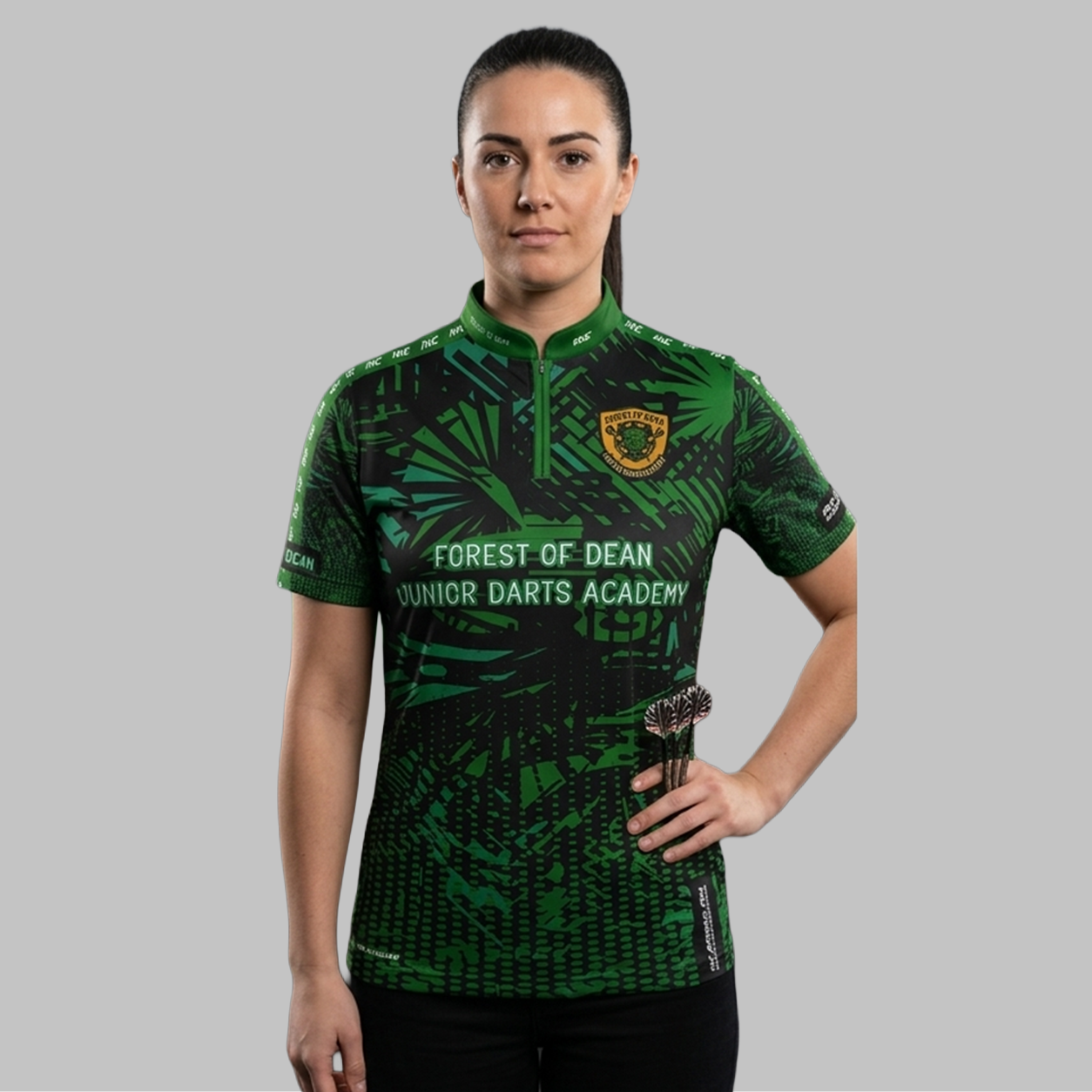 Front view of the Women's Forest of Dean Junior Darts Academy Shirt, showing the custom-contoured athletic fit and official academy crest on the chest.