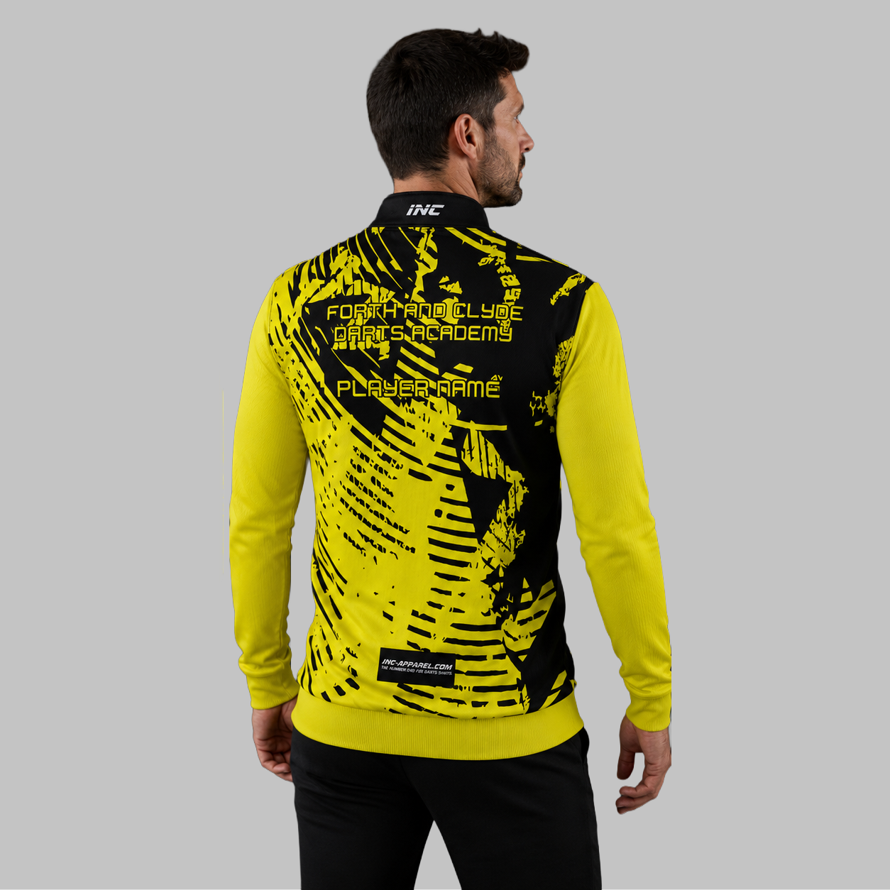 Back view of the unisex Forth and Clyde Darts Academy Quarter Zip Midlayer, showcasing the clean athletic silhouette and flexible shoulder construction.