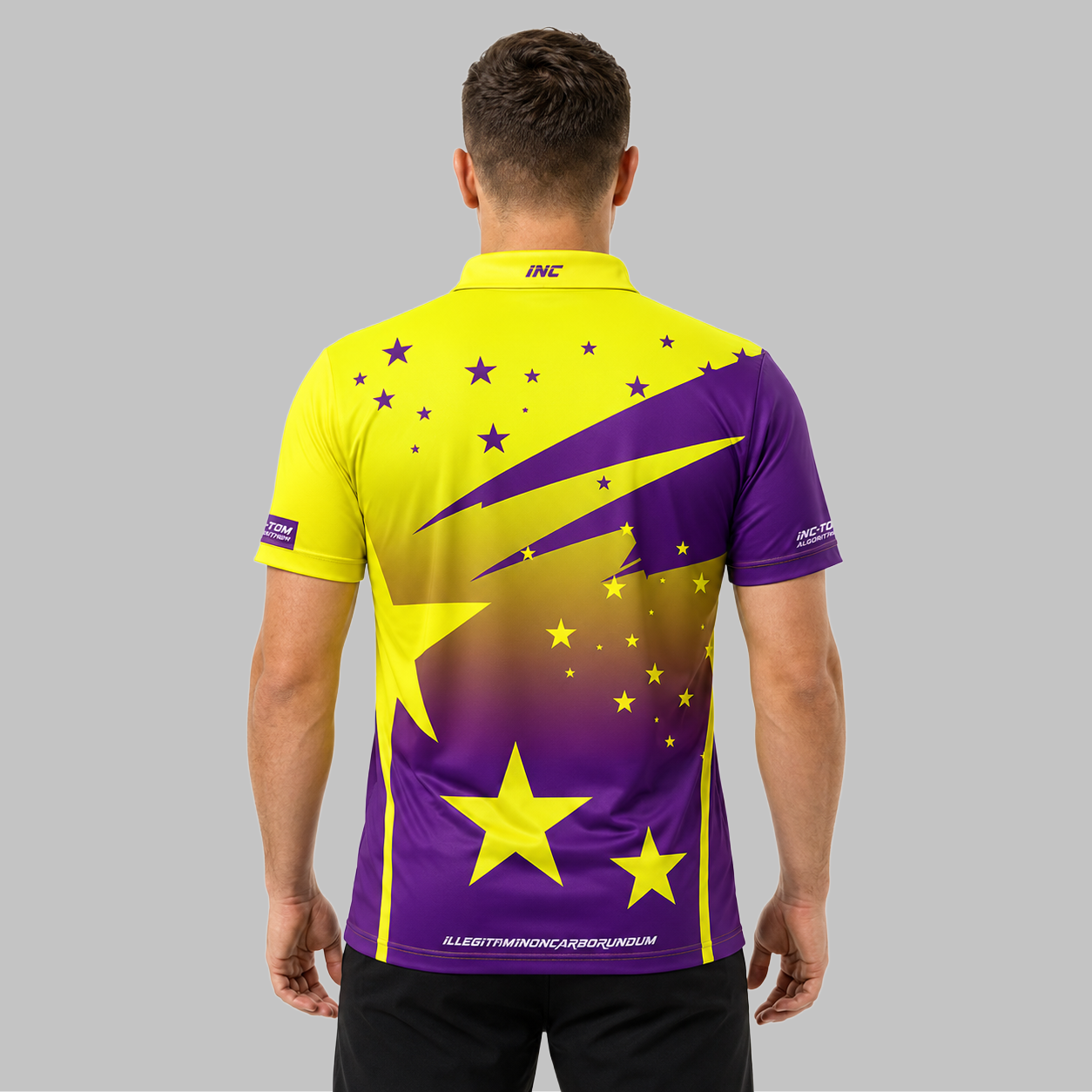 Back view of the Men and Youth Illustris Purple and Yellow Pool Shirt, showcasing the clean professional fit and flexible paneling across the shoulders.