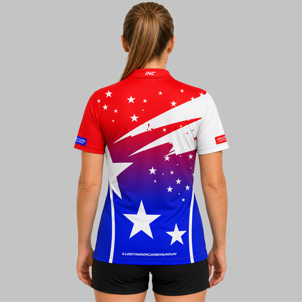 Back view of the Women's Illustris Red, White and Blue Pool Shirt, showcasing the clean silhouette and flexible fabric paneling across the shoulders.
