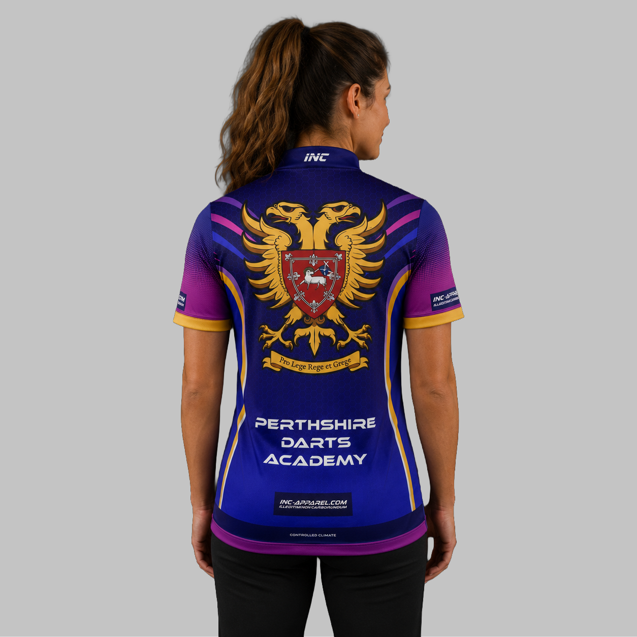 Back view of the Women's JDC Perthshire Darts Academy Shirt, showcasing the seamless flow of the sublimated academy design across the shoulders.