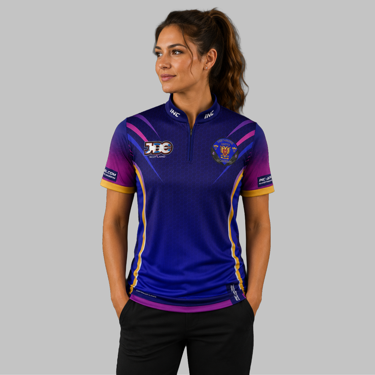 Front view of the Women's JDC Perthshire Darts Academy Shirt, showing the custom-contoured athletic fit and official academy crest on the chest.