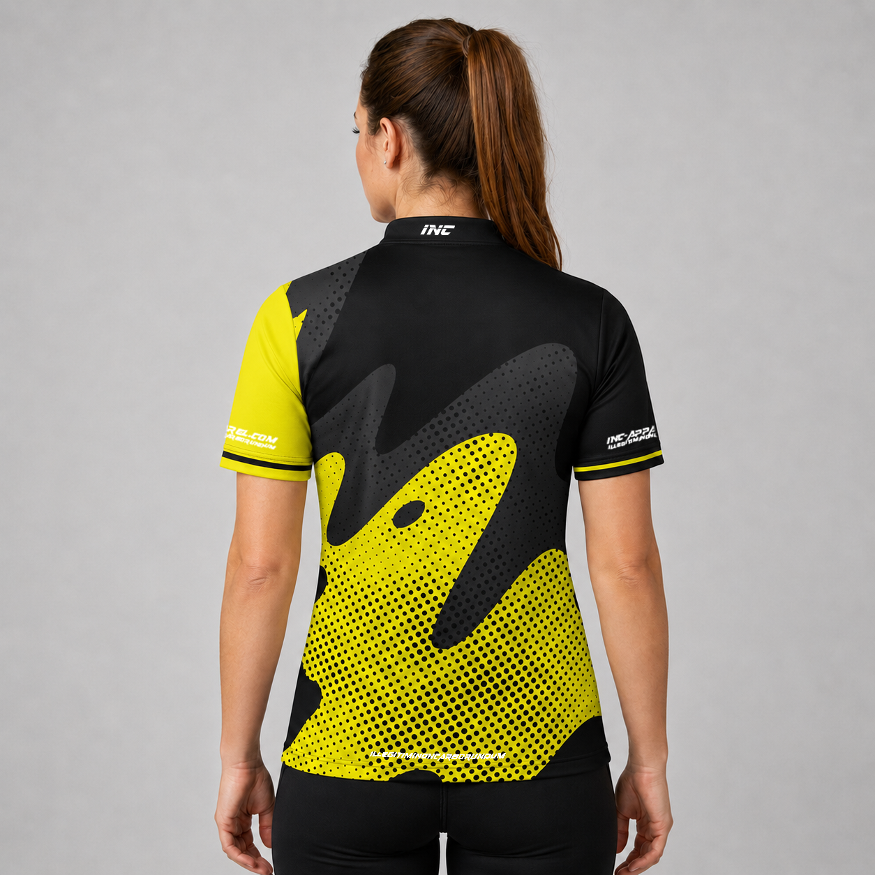 Back view of the Womens Ludicrus black and yellow darts and pool shirt, showing the continuation of the bold graphic pattern layout.