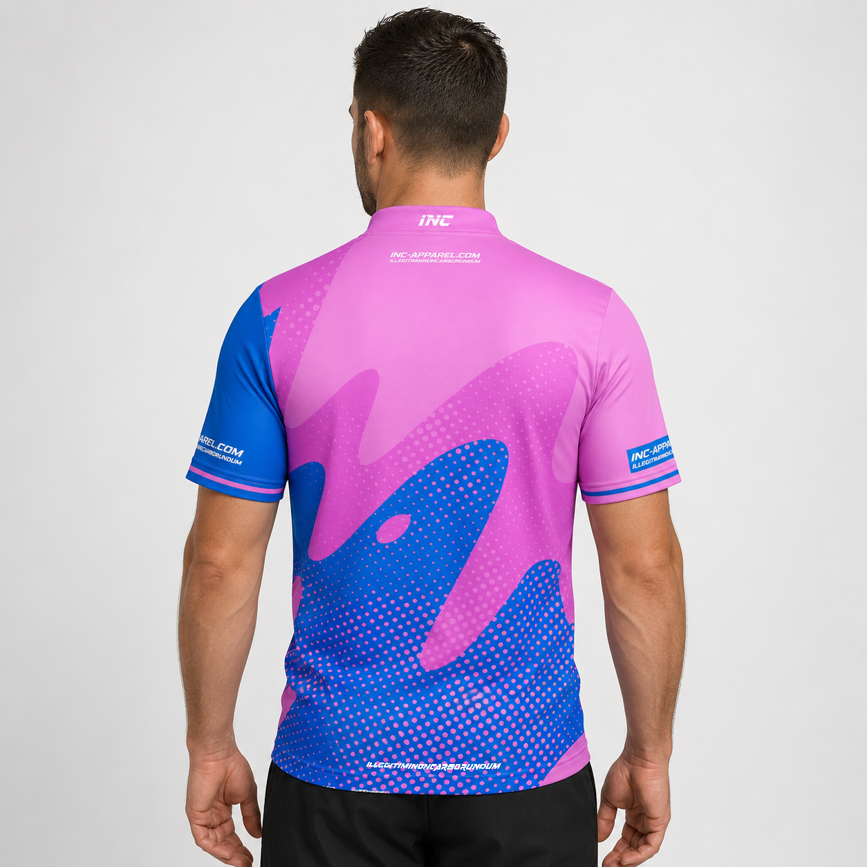 Back view of the Men and Youth Ludicrus pink and blue darts and pool shirt, showing the clean continuation of the bold graphic pattern.