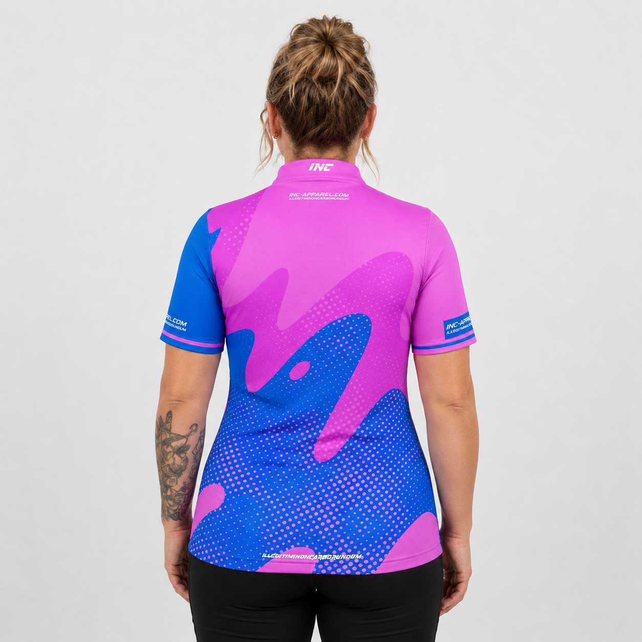 Back view of the Womens Ludicrus pink and blue darts and pool shirt, showing the continuation of the bold graphic pattern layout.