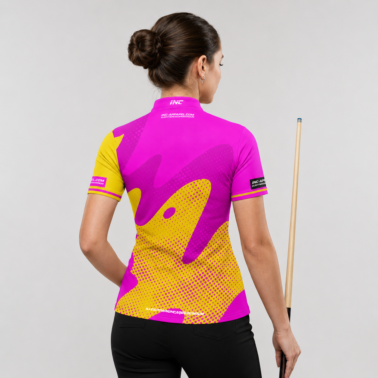 Back view of the Womens Ludicrus pink and yellow darts and pool shirt, showing the continuation of the bold graphic pattern layout.
