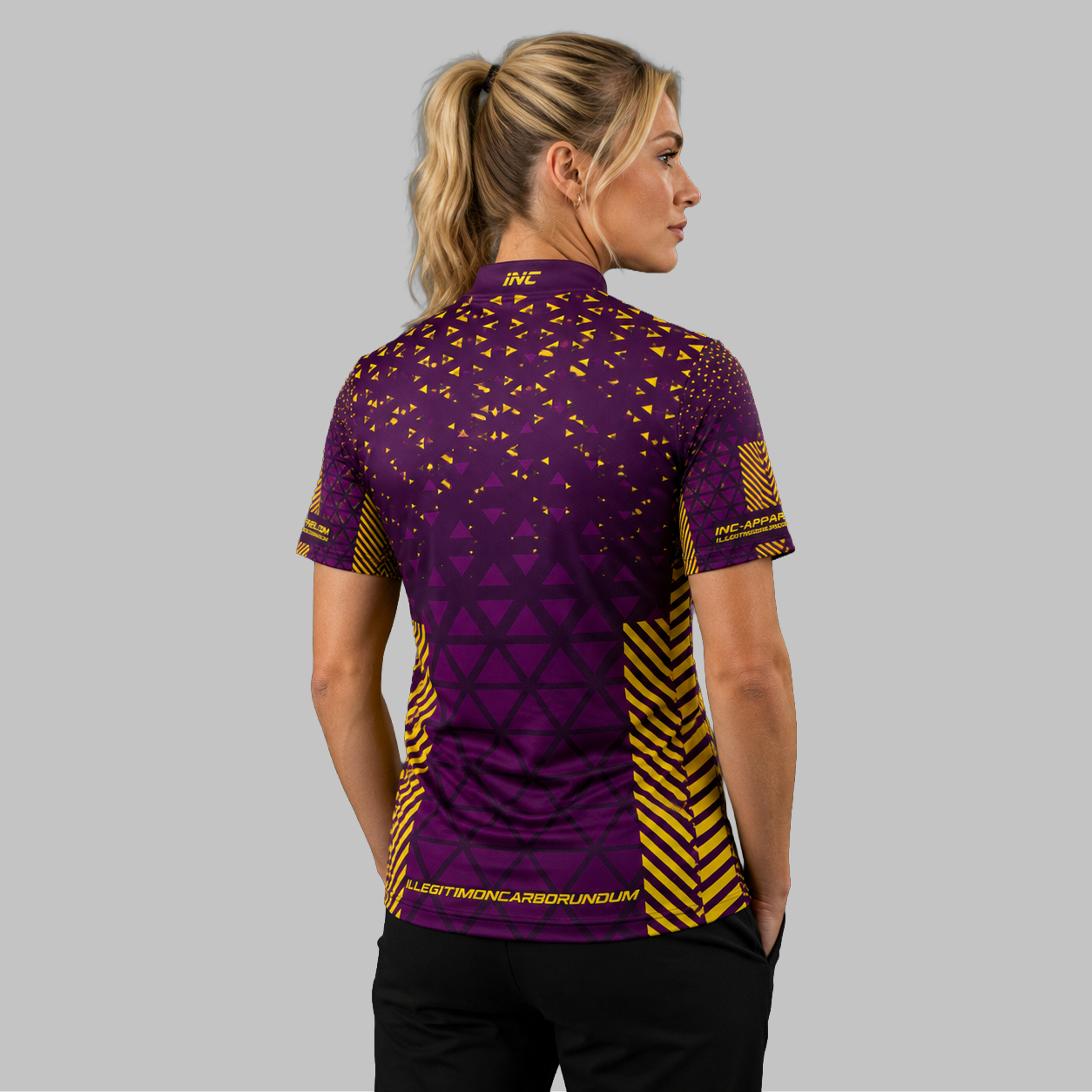 Back view of the Women's Magnus purple and yellow darts and pool shirt, highlighting the seamless continuation of the premium athletic pattern across the shoulders.