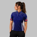 Front view of the Women's Magnus red, white, and blue darts and pool shirt, showcasing the custom-tailored athletic jersey layout with vivid patriotic geometric graphics.