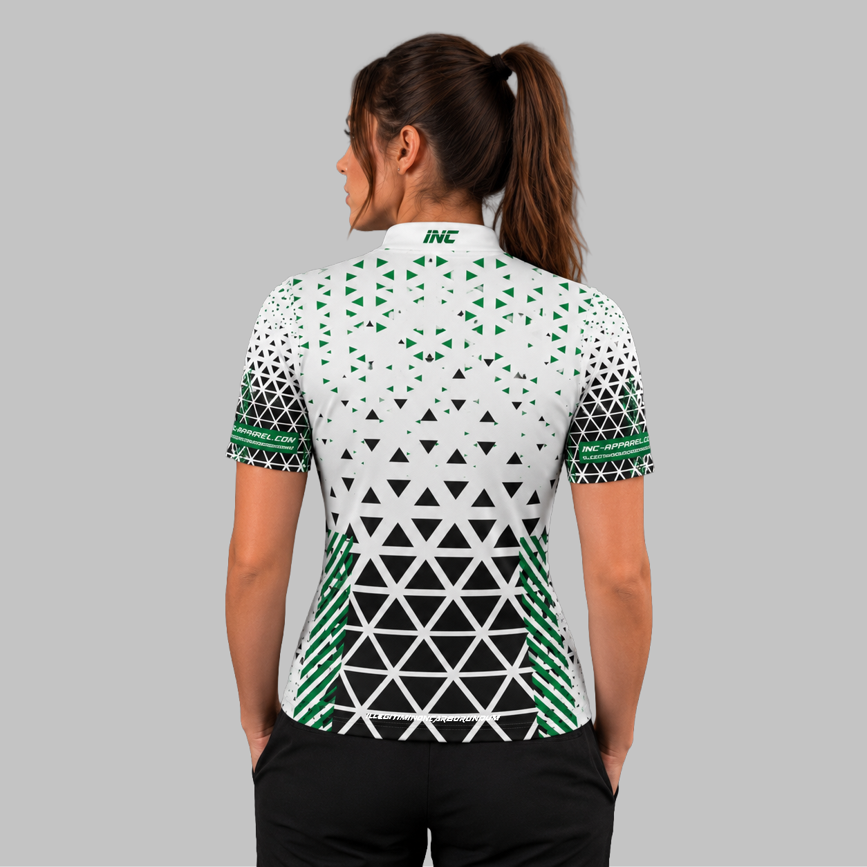 Back view of the Women's Magnus white and green darts and pool shirt, highlighting the seamless continuation of the premium athletic pattern across the shoulders.