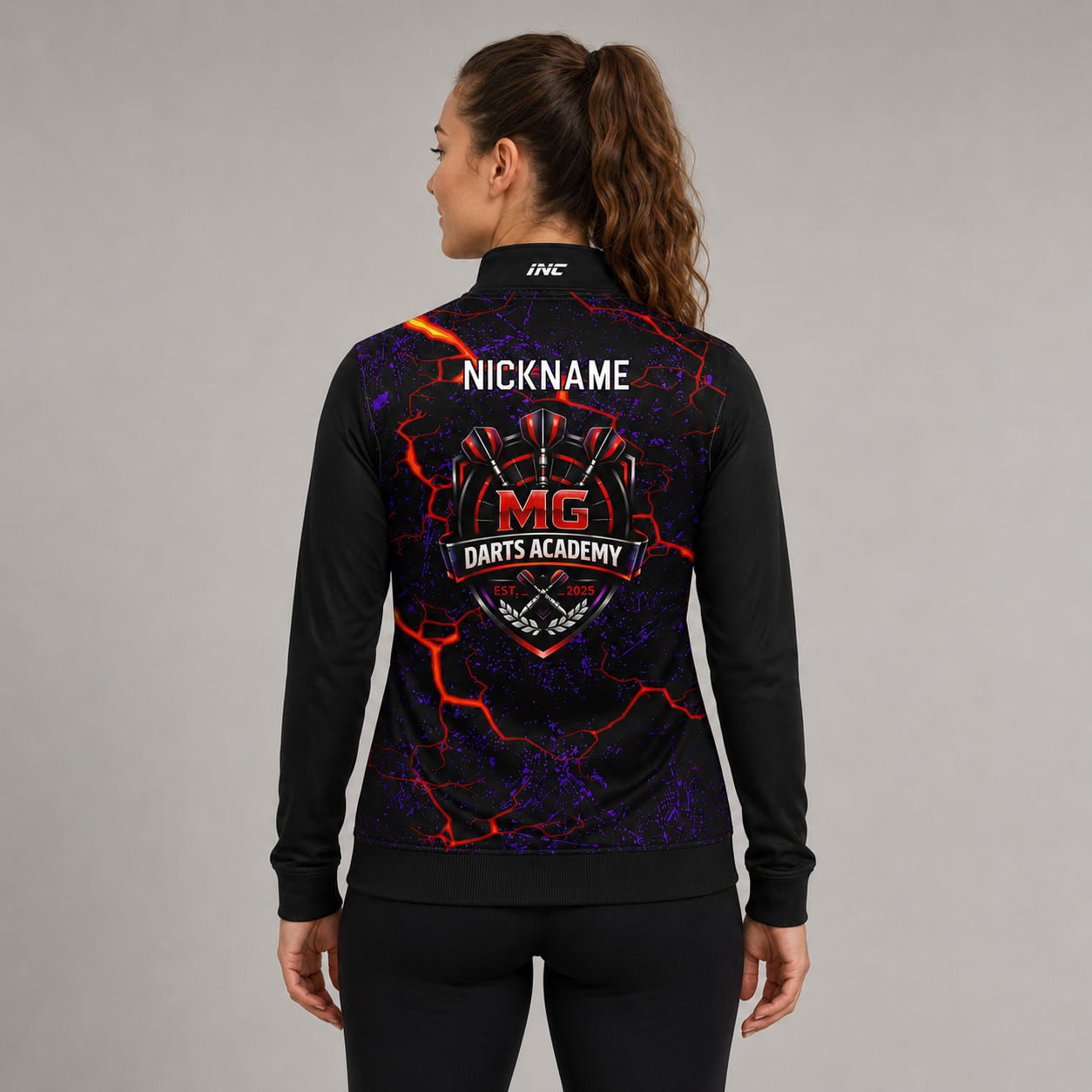 Back view of the unisex MG Darts Academy Quarter Zip Midlayer, showcasing the clean athletic silhouette and flexible shoulder construction.