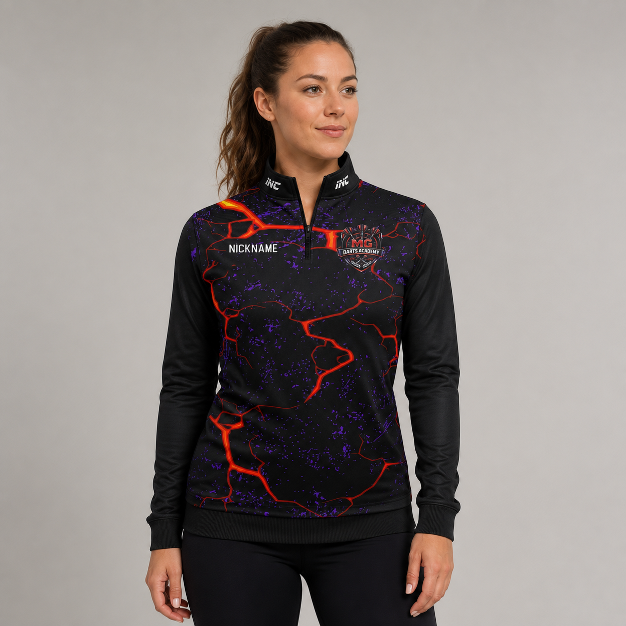 Front view of the unisex MG Darts Academy Quarter Zip Midlayer, highlighting the athletic team styling, stand-up collar, and official academy crest.