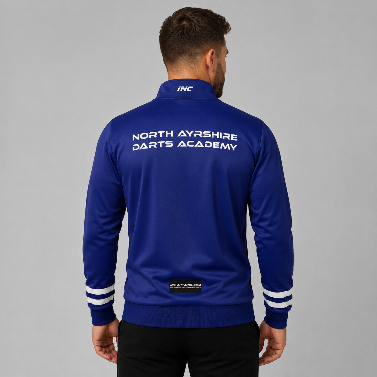 Back view of the unisex North Ayrshire Darts Academy Tournament Jacket, showing the clean team color panels and comfortable outer-shell design across the shoulders.