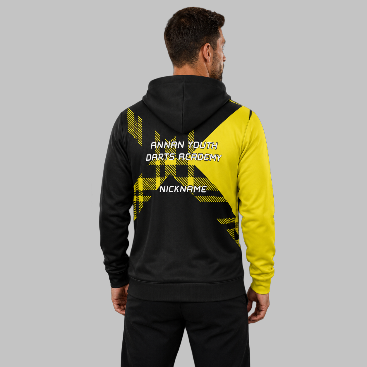 Back view of the unisex Official Annan Youth Darts Academy hoodie, showcasing the clean fit and double-lined hood architecture.