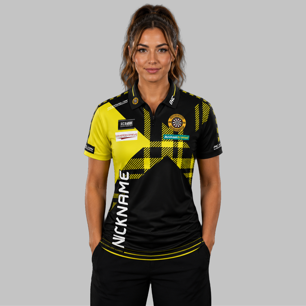 Front view of the Women's Official Annan Youth Darts Academy shirt, showing the custom-contoured athletic fit and prominent academy branding.
