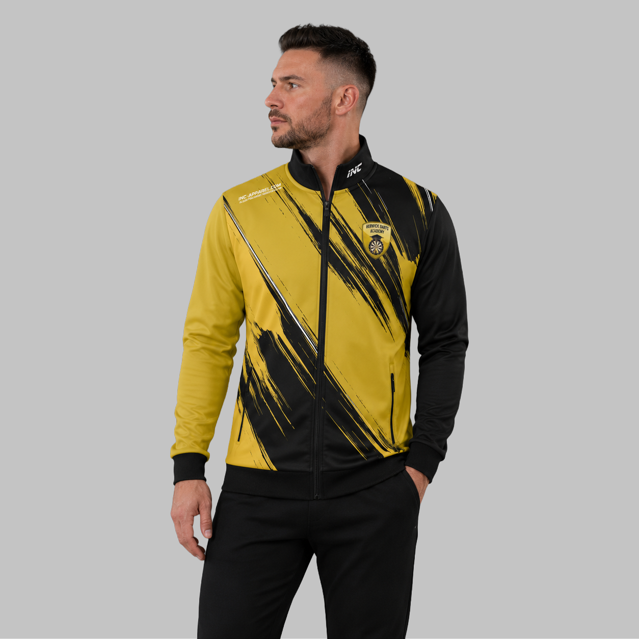 Front view of the unisex Official Berwick Darts Academy Tournament Jacket, highlighting the sleek full-zip design, athletic collar, and prominent academy branding.