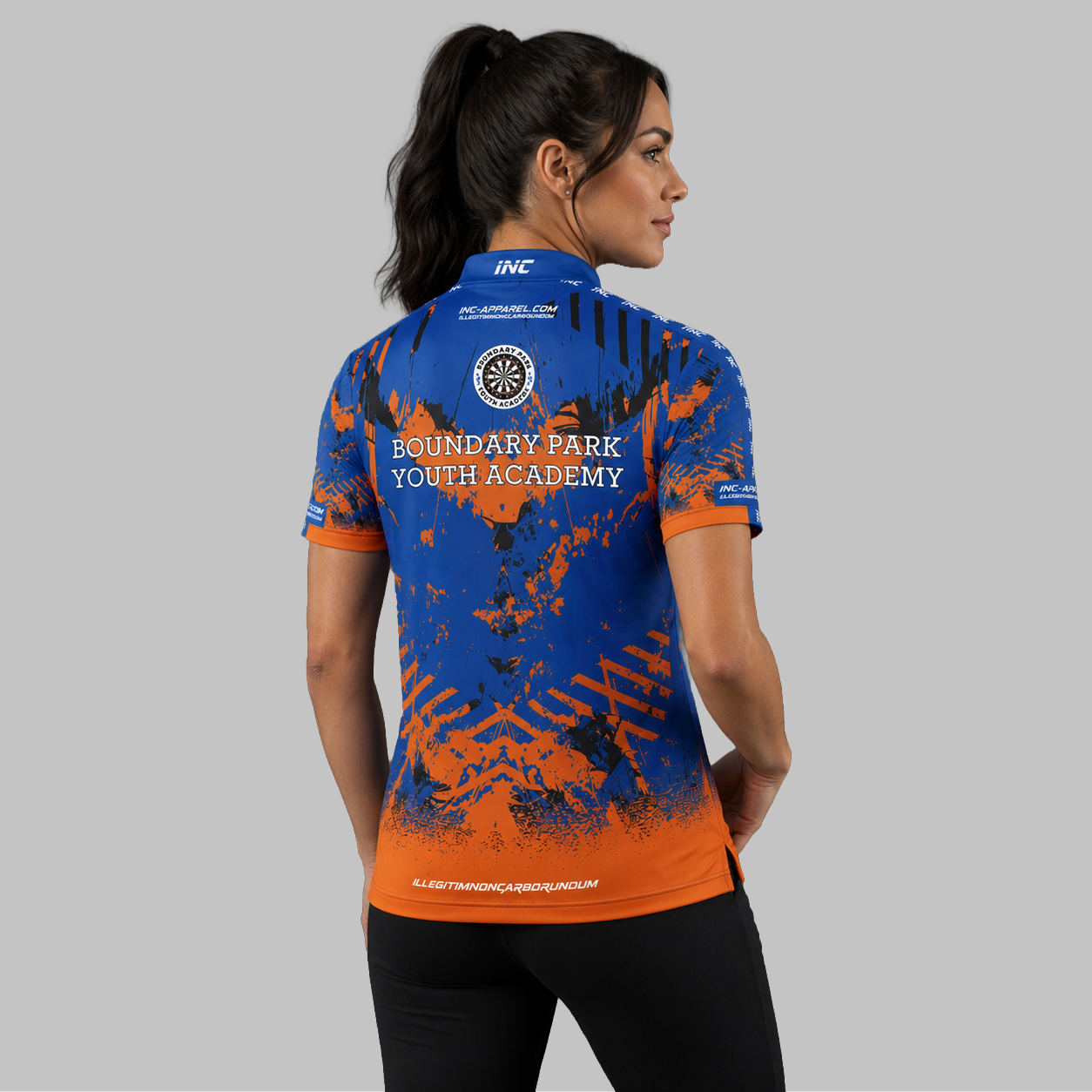 Back view of the Women's Official Boundary Park Youth Darts Academy shirt, showcasing the seamless flow of the sublimated team design across the shoulders.