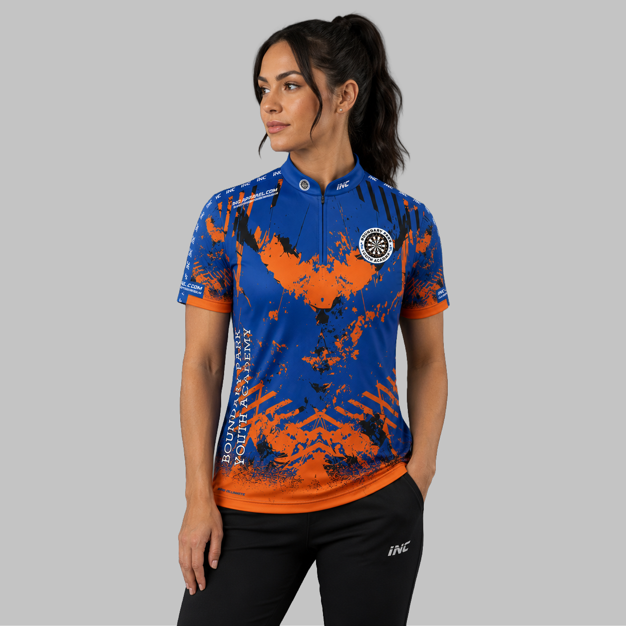 Front view of the Women's Official Boundary Park Youth Darts Academy shirt, showing the custom-contoured athletic fit and prominent academy branding.