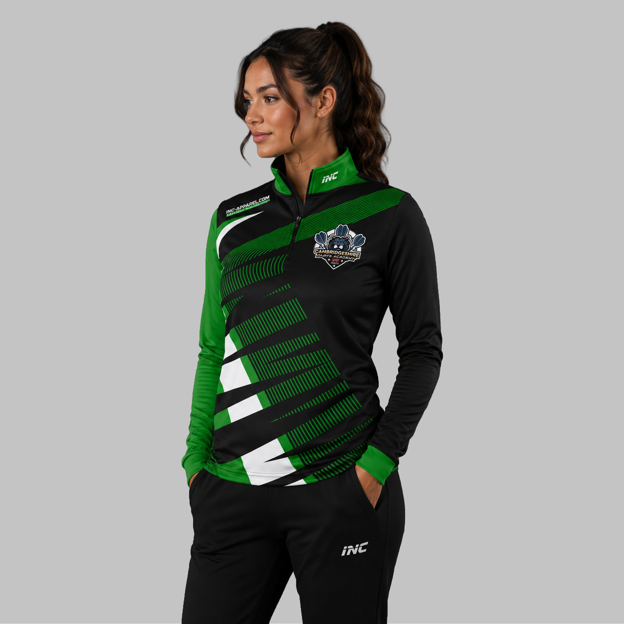 Front view of the unisex Official Cambridgeshire Darts Academy Quarter Zip Midlayer, highlighting the athletic pullover design, stand-up collar, and official branding.