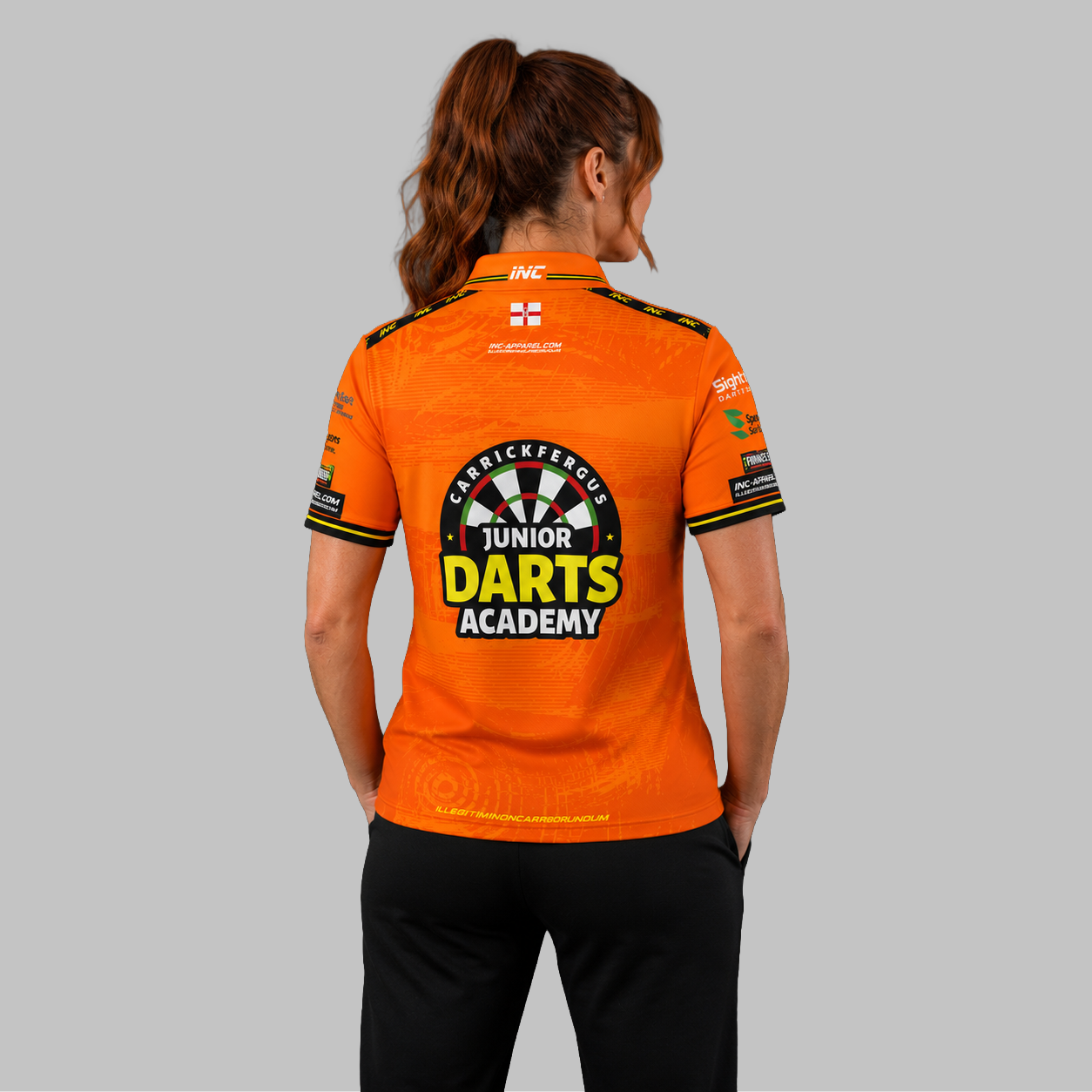 Back view of the Women's Official Carrickfergus Junior Darts Academy shirt, showcasing the seamless flow of the sublimated team design across the shoulders.