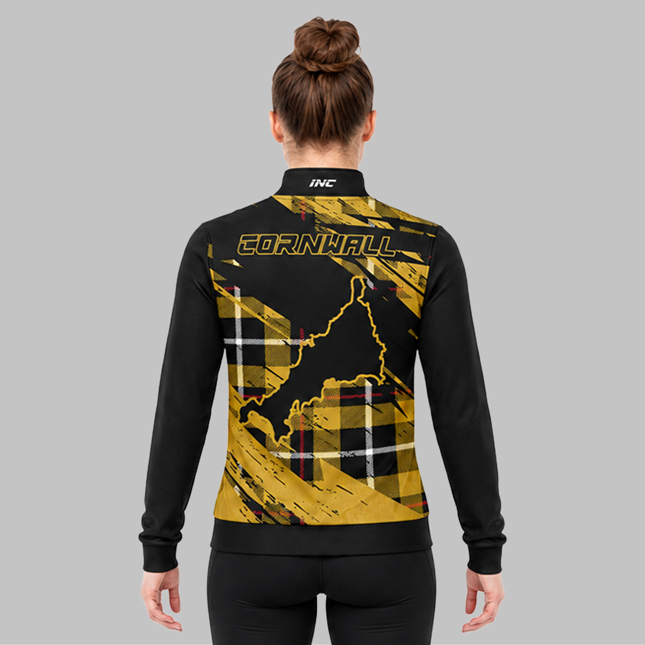 Back view of the unisex Official Cornwall County Pool Quarter Zip Midlayer, showcasing the clean professional fit and flexible shoulder paneling.