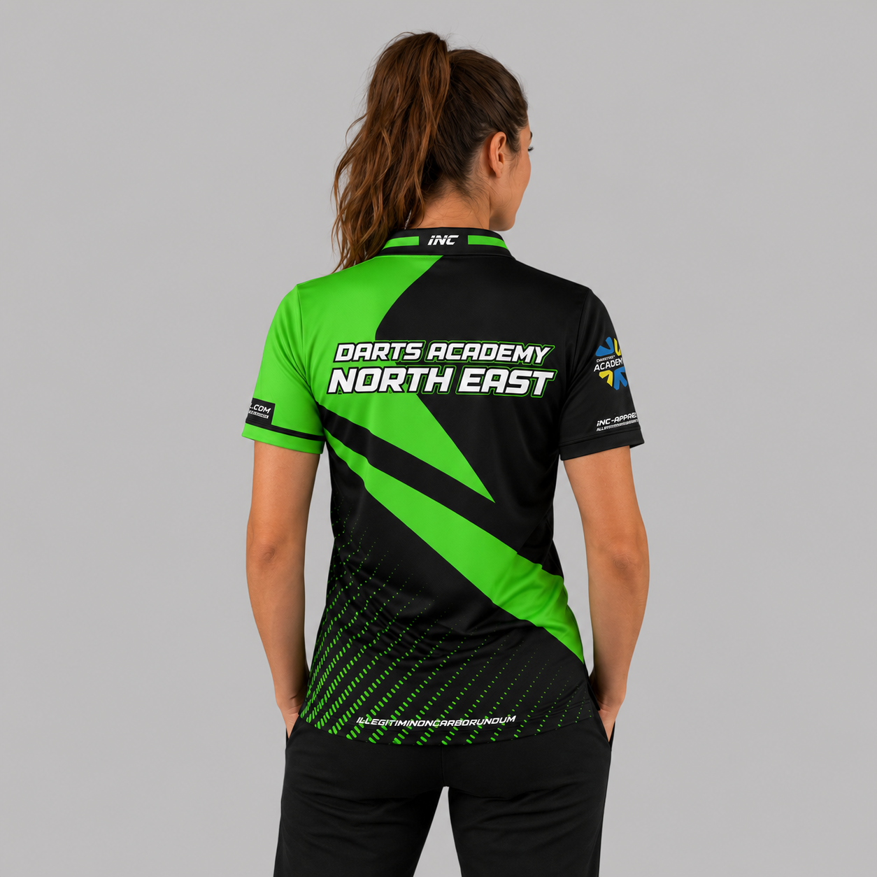 Back view of the Women's Official Darts Academy North East Shirt, showcasing the seamless flow of the sublimated team design across the shoulders.