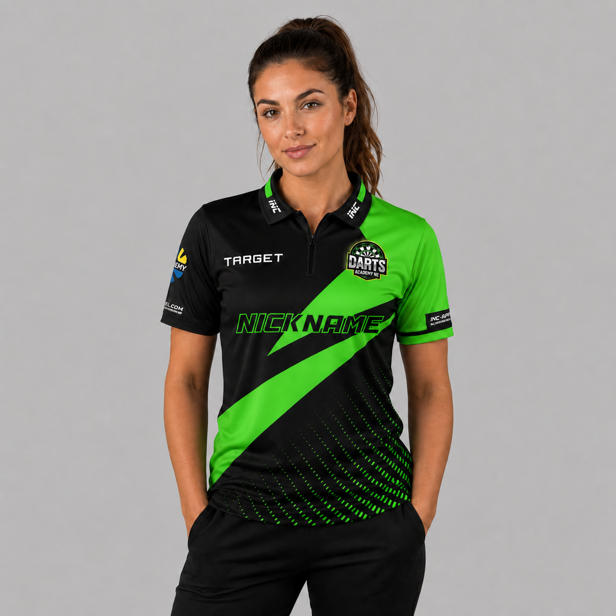 Front view of the Women's Official Darts Academy North East Shirt, showing the custom-contoured athletic fit and official branding on the chest.