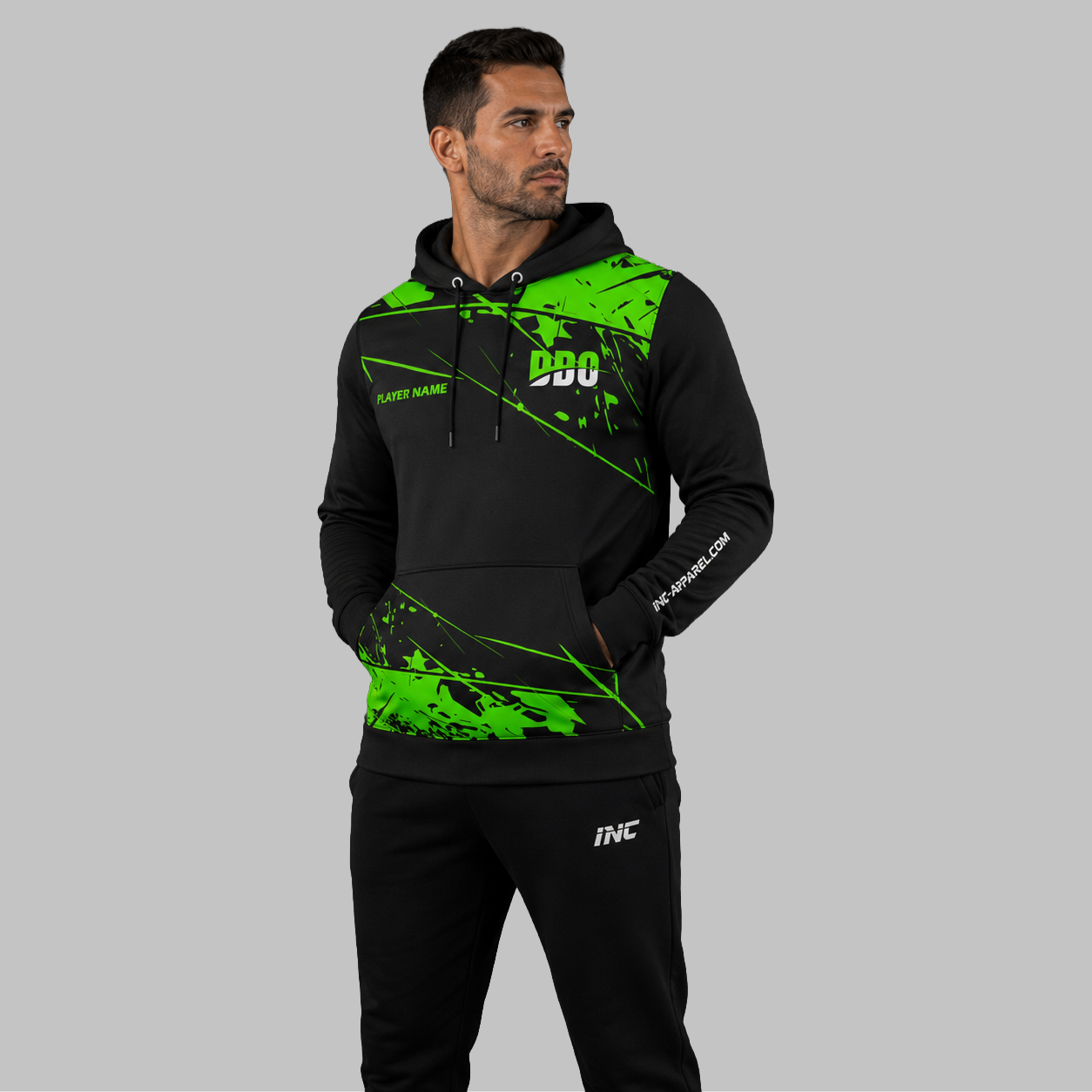 Front view of the unisex Official Deaf Darts Organisation Green Hoodie, highlighting the cozy fleece design and bold DDO branding across the chest.