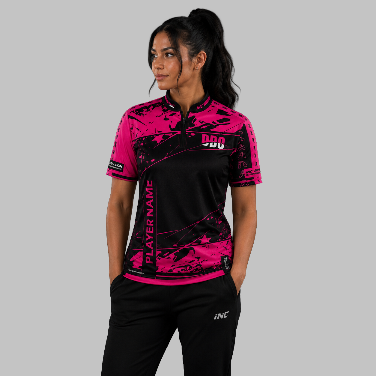 Front view of the Women's Official Deaf Darts Organisation Pink and Black shirt, showing the custom-contoured athletic fit and prominent DDO branding.