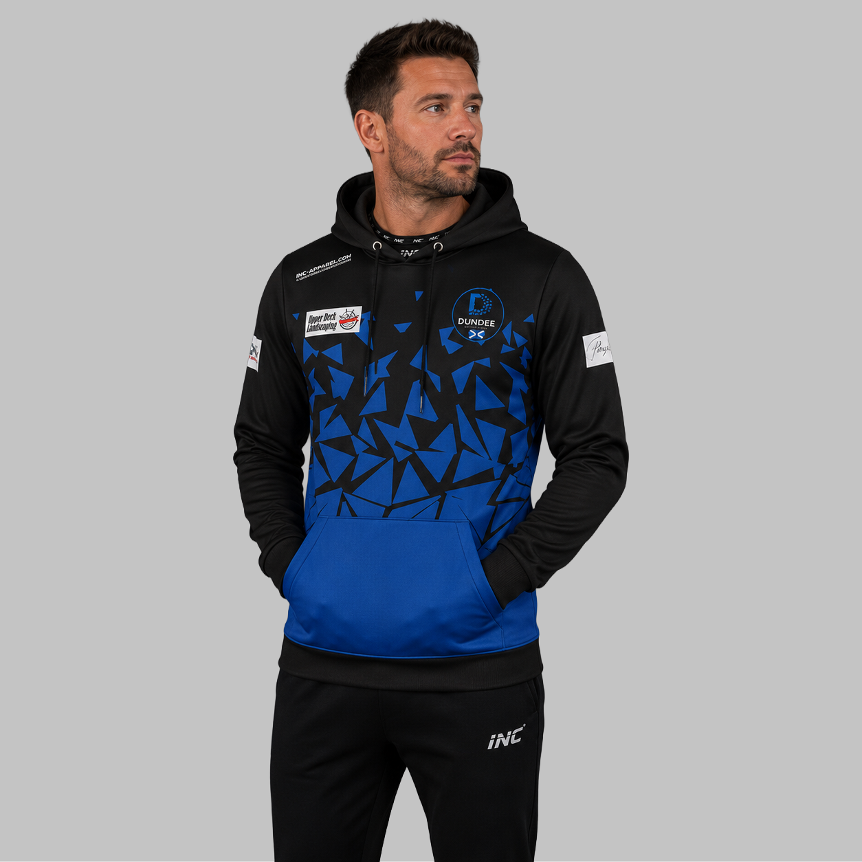 Front view of the unisex Official Dundee Darts Academy Hoodie, highlighting the cozy fleece design and bold academy branding across the chest.