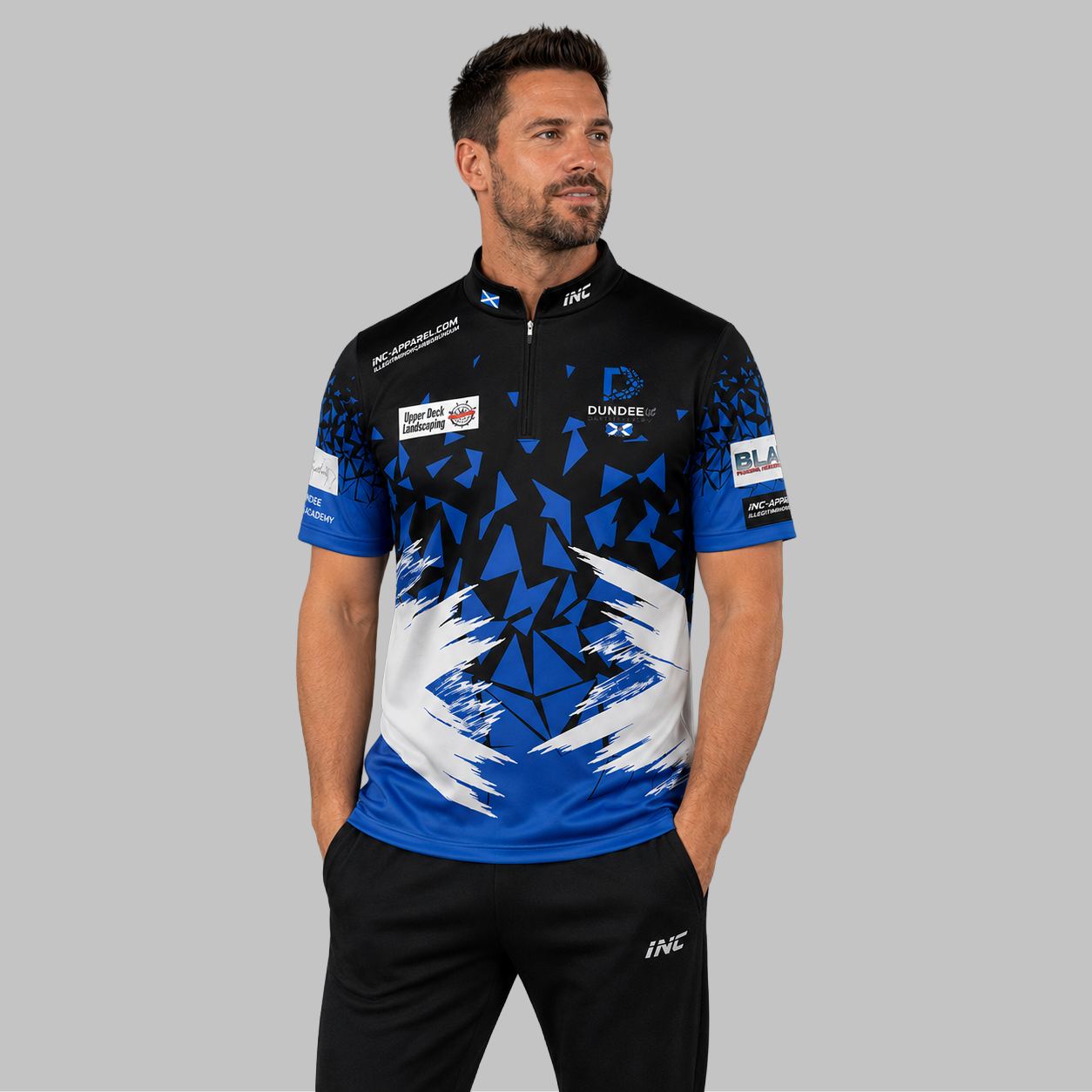 Front view of the Men and Youth Official Dundee Darts Academy Darts Shirt, showcasing the professional athletic design and prominent academy branding.
