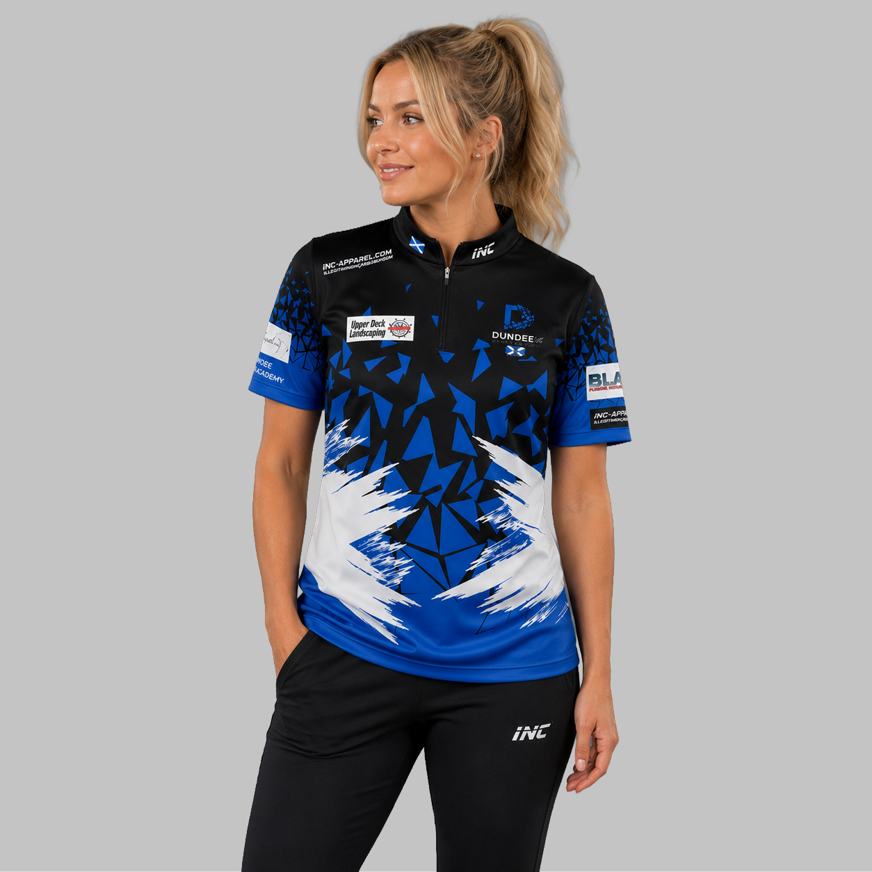 Front view of the Women's Official Dundee Darts Academy Darts Shirt, showing the custom-contoured athletic fit and prominent academy branding.