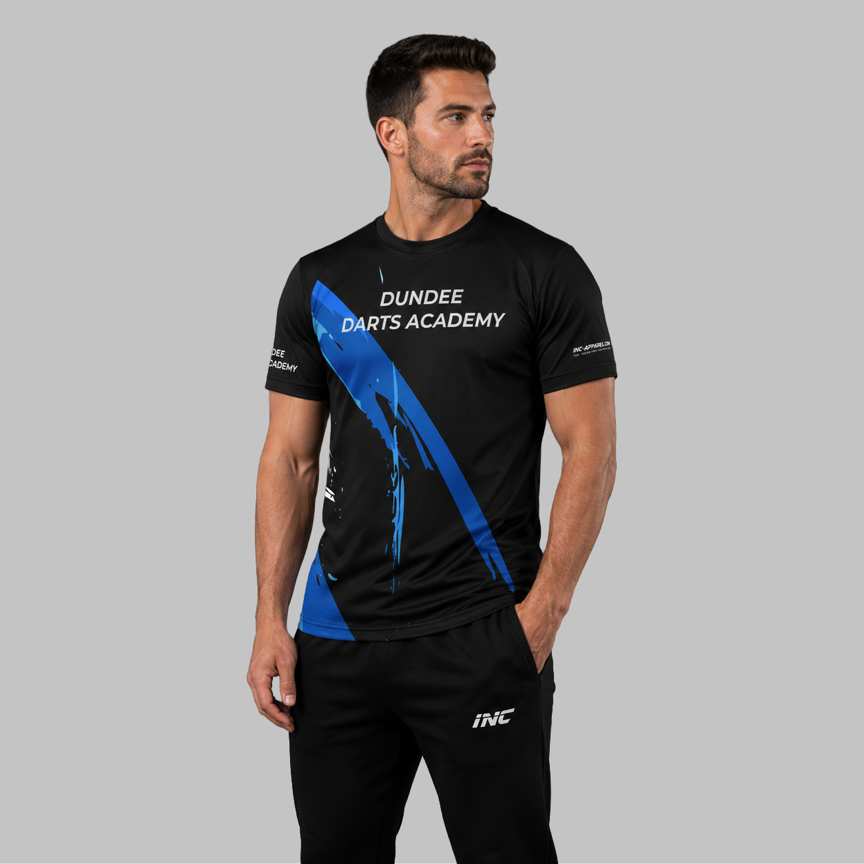 Front view of the unisex Official Dundee Darts Academy Training Tee, showing the sleek athletic cut and official academy logo across the chest.