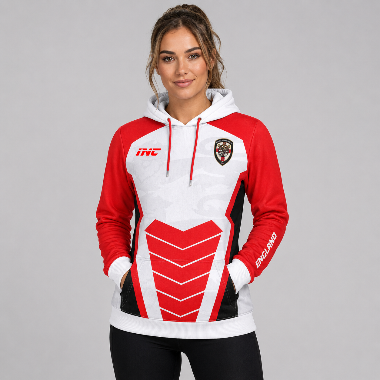 Front view of the Womens Official England Inclusio darts team hoodie, showing the comfortable fit, kangaroo pocket, and patriotic sublimated chest graphics.