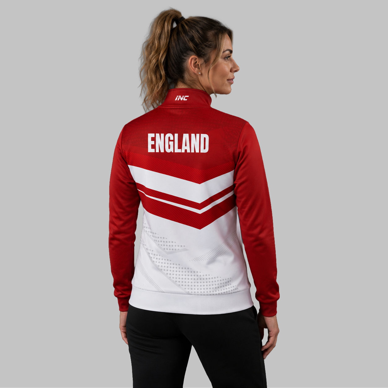 Back view of the unisex Official England JDC Darts Quarter Zip Midlayer, showcasing the clean athletic silhouette and flexible shoulder construction.