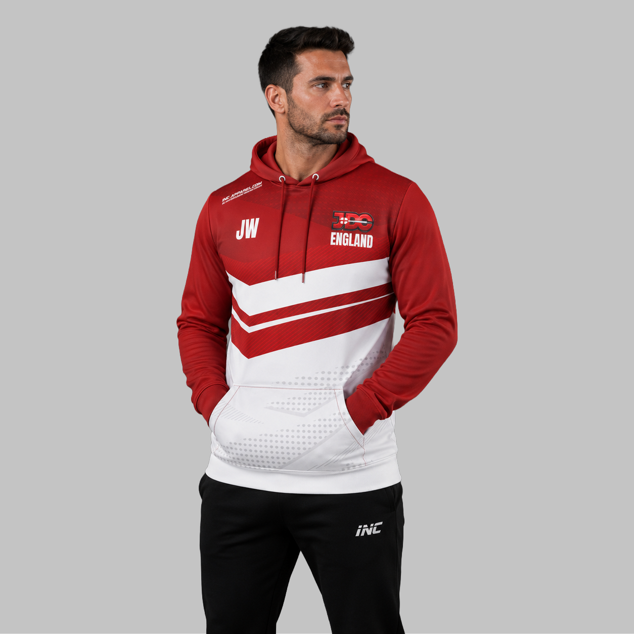 Front view of the unisex Official England JDC Darts Quarter Zip Midlayer, highlighting the athletic national team styling, stand-up collar, and official JDC branding.