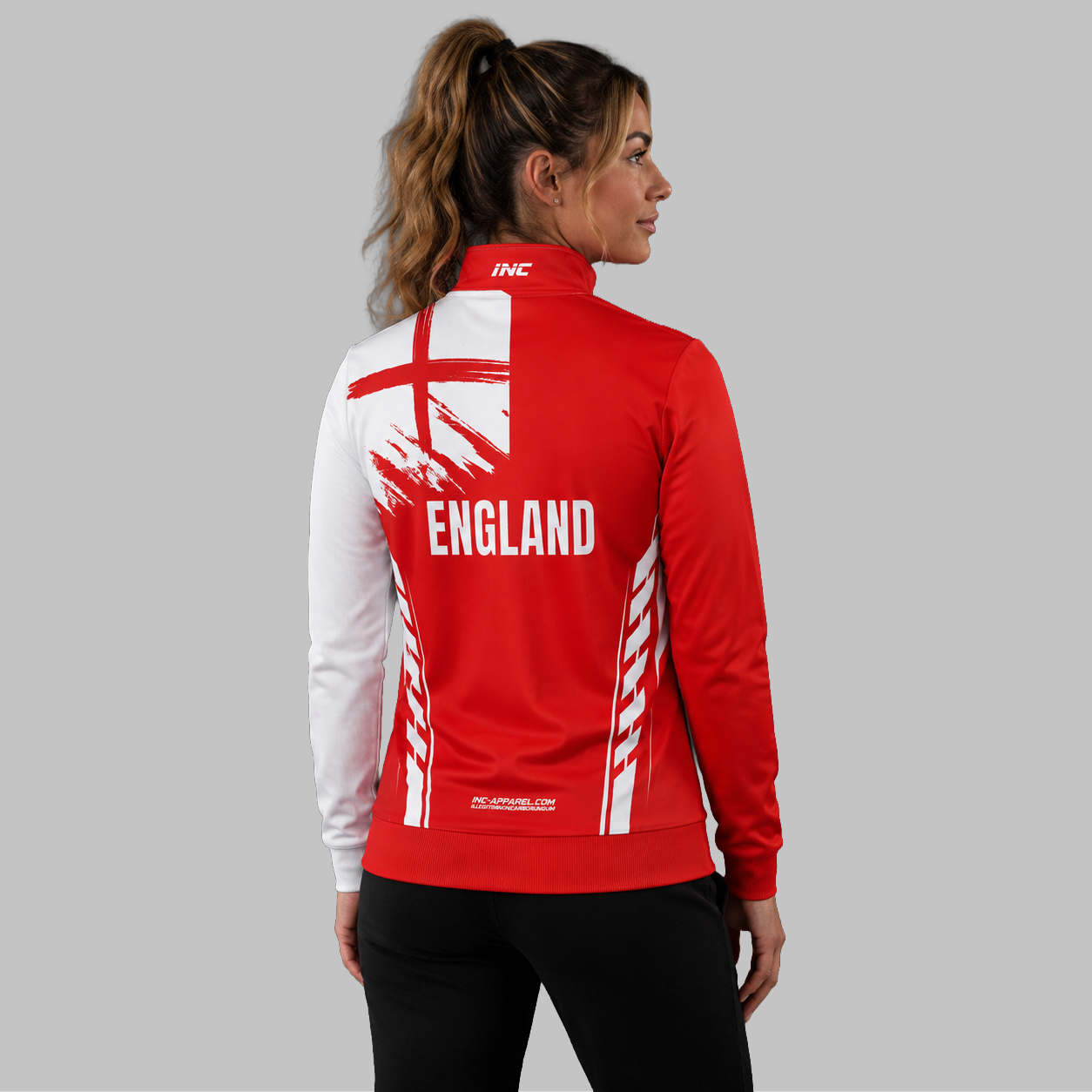 Back view of the unisex Official England Youth Darts Organisation Quarter Zip Midlayer, showcasing the clean athletic silhouette and flexible shoulder construction.