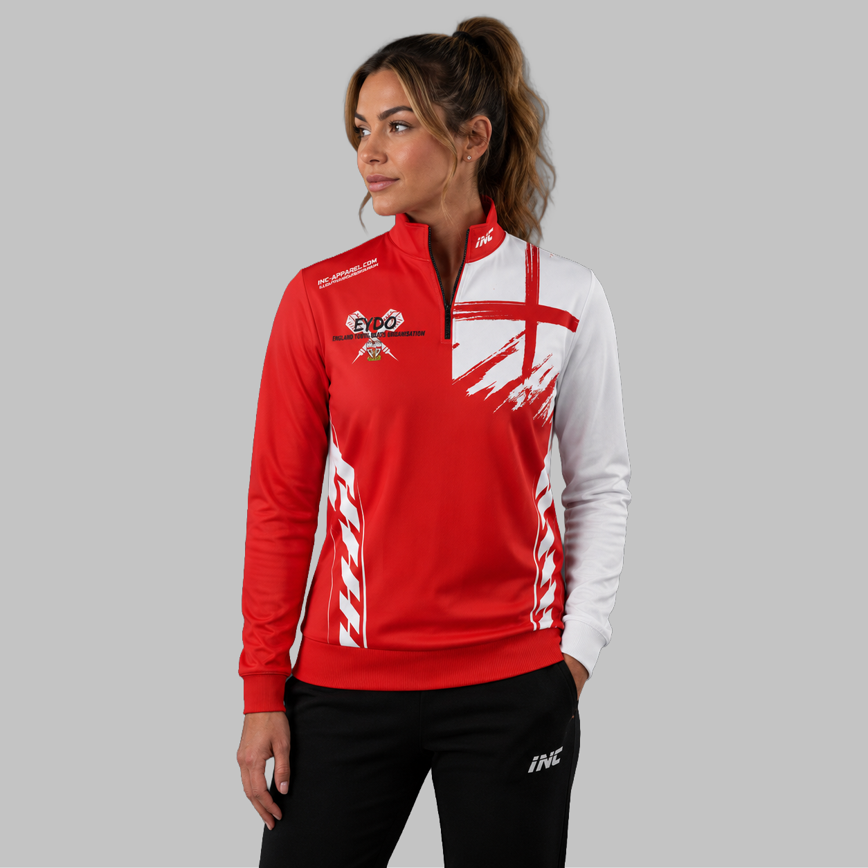 Front view of the unisex Official England Youth Darts Organisation Quarter Zip Midlayer, highlighting the athletic national team styling, stand-up collar, and official EYDO branding.