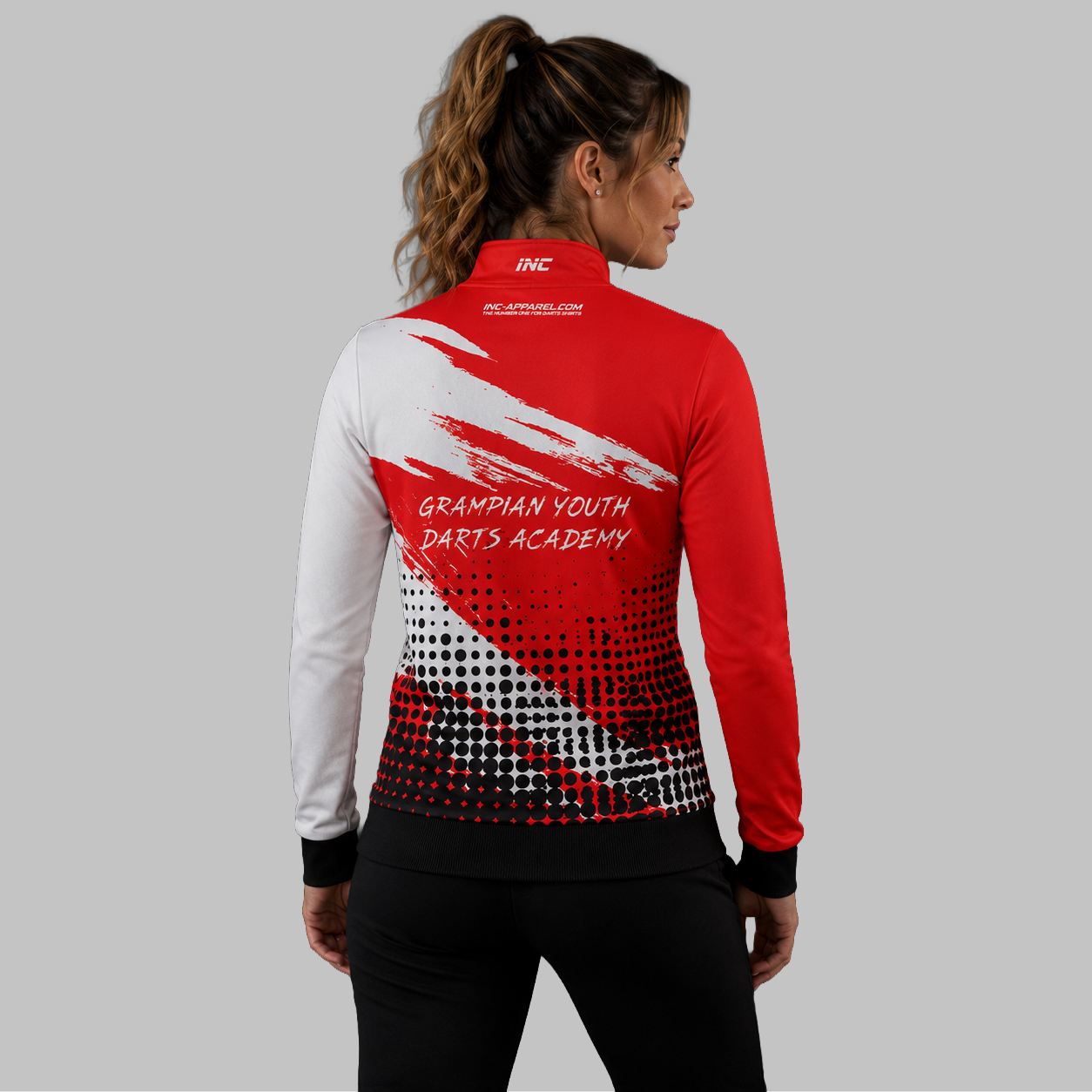 Back view of the unisex Official Grampian Youth Academy Quarter Zip Midlayer, showcasing the clean athletic silhouette and flexible shoulder construction.